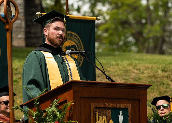 Matthew Bonestell stands at a podium.