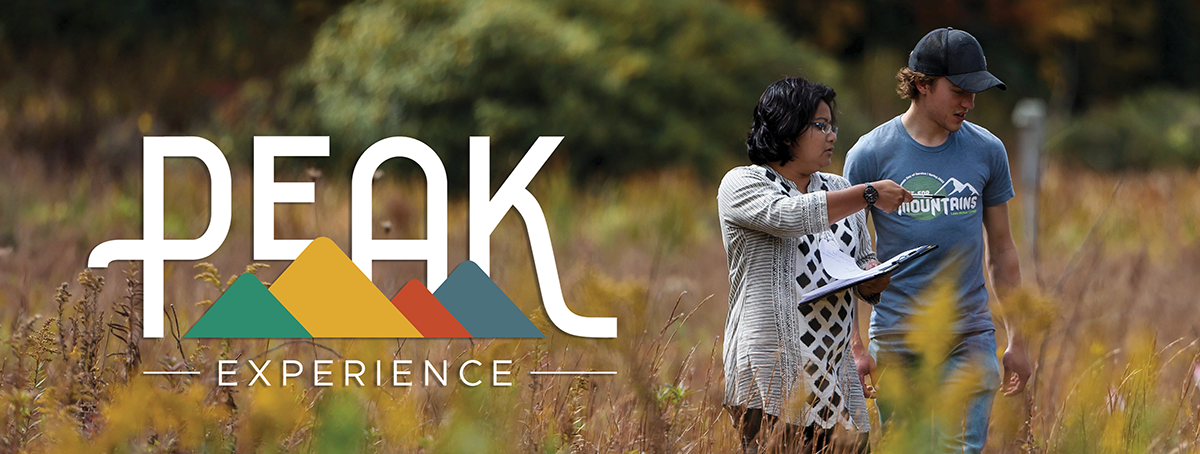 PEAK Experience logo overlayed on a photo of a professor and student in the Elk Valley Preserve.